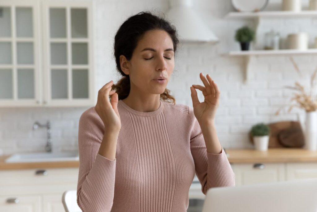 person breathing and meditating to try and recovery from multiple types of ocd