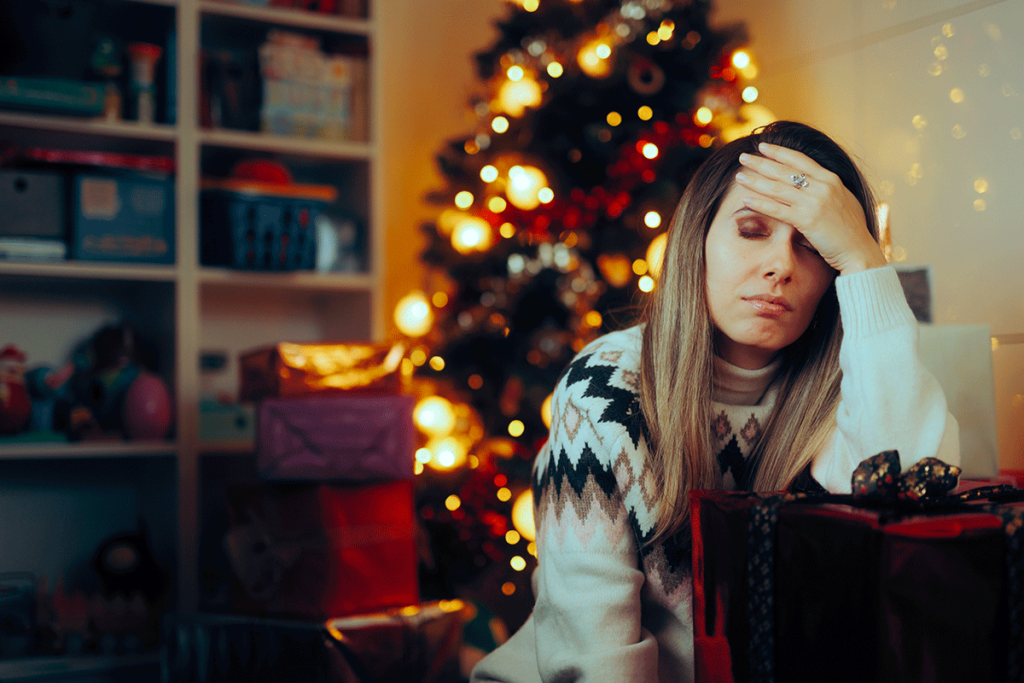 a woman struggles to manage her holiday stress